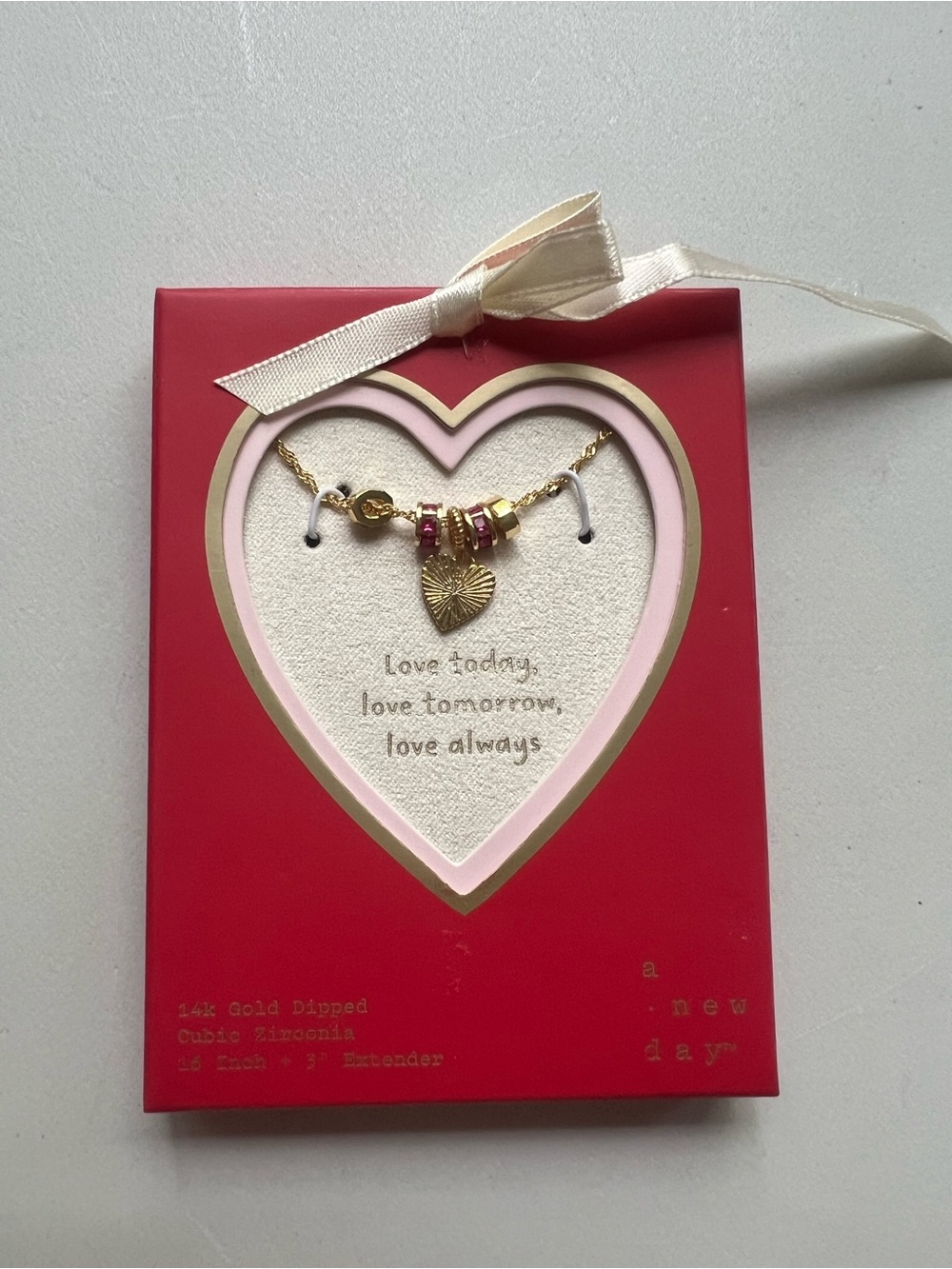 a new day Gold Dipped Heart Charm Necklace with Pink Accents